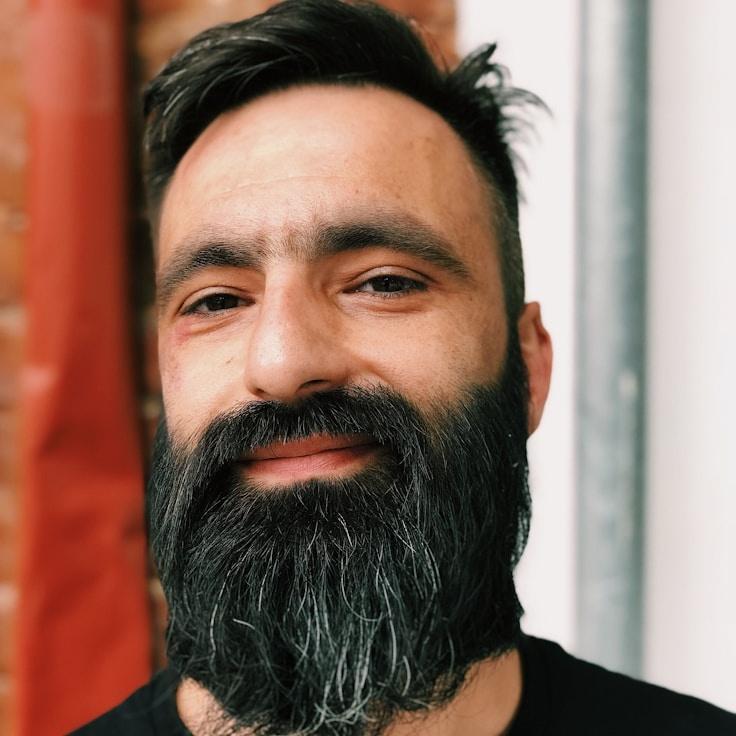 Jonah Reed, Client Relations Director, discussing corporate gifting strategy with business clients